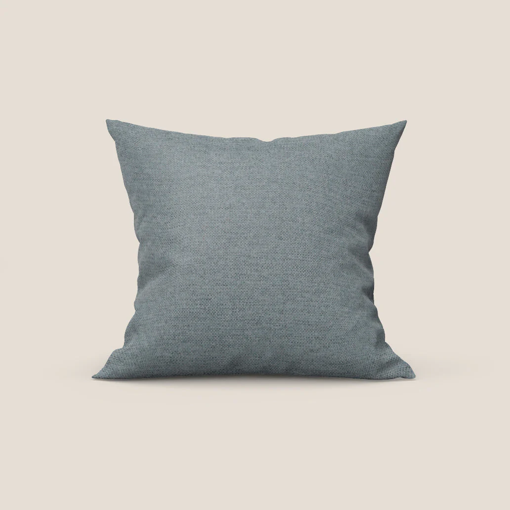 Tobago coussin disponible en différentes couleurs en tissu flammé effet coton imperméable T19 bleu pastel